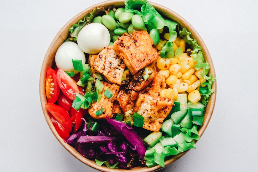 Colorful healthy bowl with vegetables and grains, representative of meals tracked in nutrition apps
