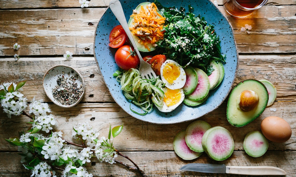 A balanced meal photographed from above, the kind of dish a calorie tracking app helps you log accurately